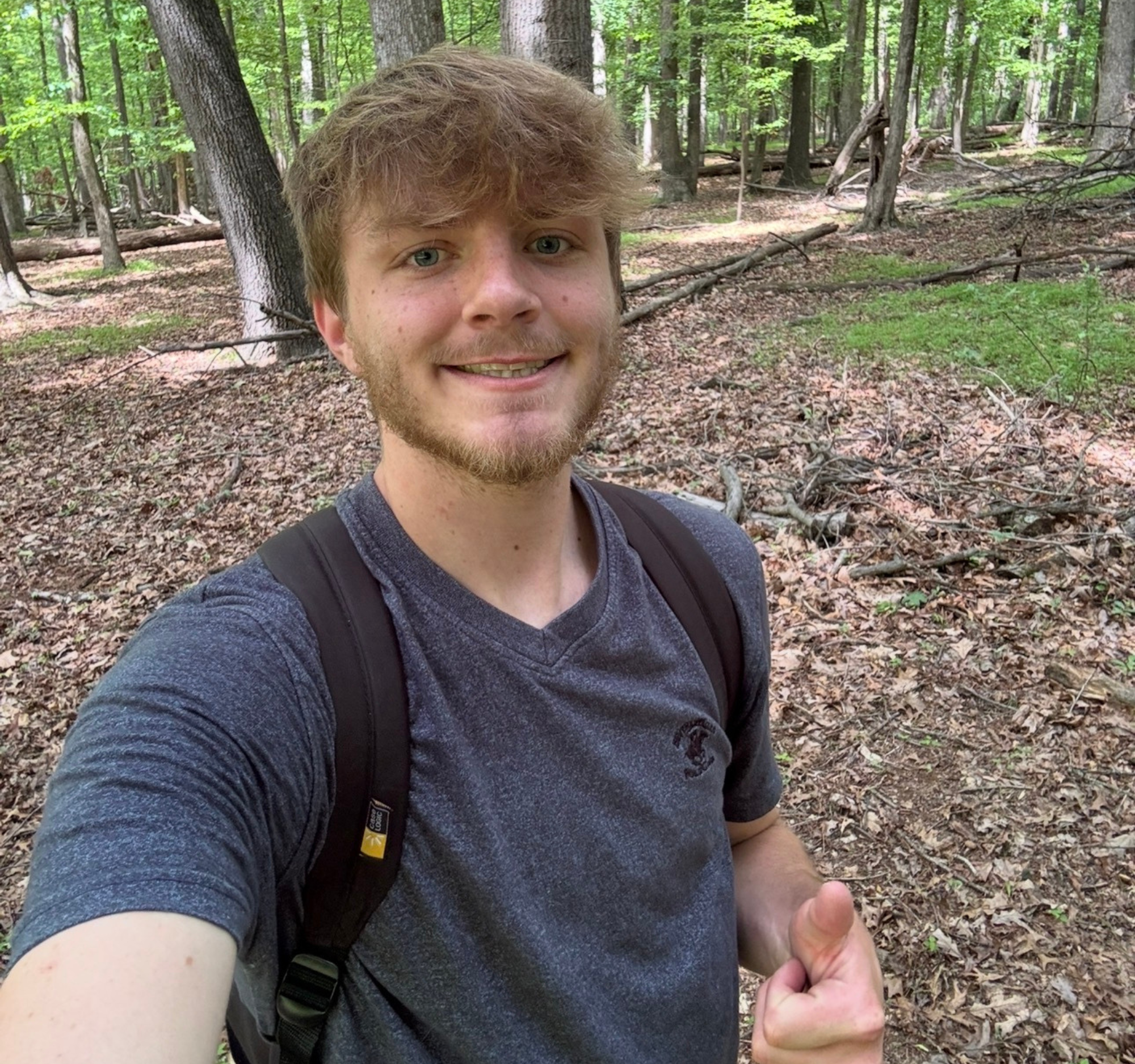 Jacob Shaffer exploring in the woods