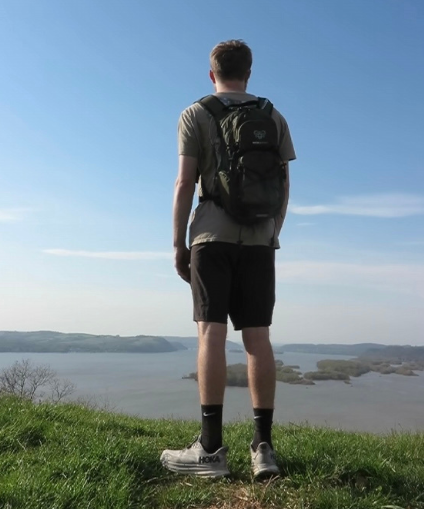 Jacob Shaffer looking out across a natural landscape